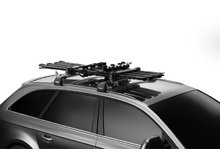 Две пары лыж на креплении Thule SnowPack S для авто