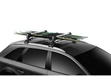 Беговые лыжи на автобагажнике Thule SnowPack Extender