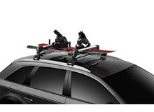 Сноуборд на креплении Thule SnowPack Extender